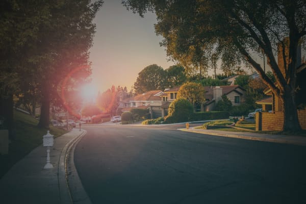 A serene suburb as the sun rises