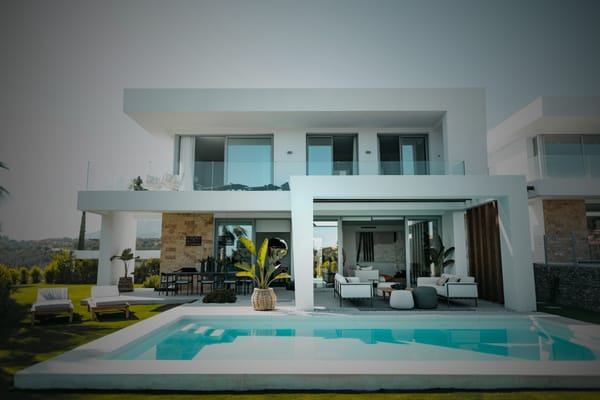 A luxury real estate property with a pool and open balcony