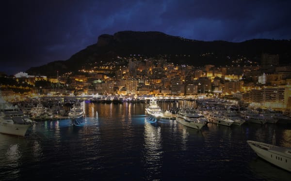 A beautiful marina full of yachts at night